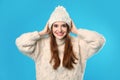 Young woman wearing Christmas sweater onbackground Royalty Free Stock Photo