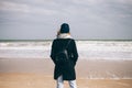 Young woman wearing coat, hat and scarf Royalty Free Stock Photo