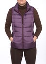 Young woman wearing dark plum down vest Royalty Free Stock Photo