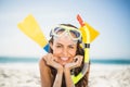 Young woman wearing flippers at the beach Royalty Free Stock Photo