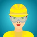 Young woman wearing a hard hat and safety glasses used in construction industry