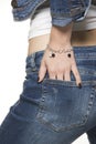 Young woman wearing jeans and silver bracelet Royalty Free Stock Photo