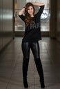 Young Woman Wearing Leather Pants And Long Sleeves Royalty Free Stock Photo