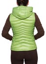 Young woman wearing light green hooded packable down puffer vest