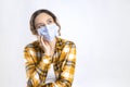 Young woman wearing medical face mask Royalty Free Stock Photo