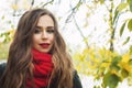 Young woman wearing red woolen scarf outdoor Royalty Free Stock Photo