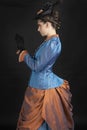 A young woman wearing an 1880s Victorian costume Royalty Free Stock Photo