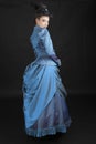 A young woman wearing an 1880s Victorian costume Royalty Free Stock Photo