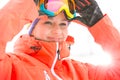 Young woman wearing ski goggles outdoors Royalty Free Stock Photo