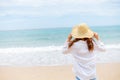 Young woman wearing sun hat on the  beach. summer, holidays, vacation, travel concept Royalty Free Stock Photo