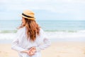 Young woman wearing sun hat on the  beach. summer, holidays, vacation, travel concept Royalty Free Stock Photo