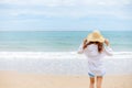 Young woman wearing sun hat on the  beach. summer, holidays, vacation, travel concept Royalty Free Stock Photo