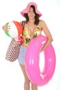 Young Woman Wearing a Swim Suit on Holiday Carrying a Beach Ball Royalty Free Stock Photo