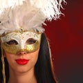 Young woman wearing a venetian mask Royalty Free Stock Photo