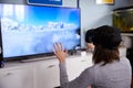 Young Woman Wearing Virtual Reality Headset In Studio Royalty Free Stock Photo