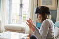 Young Woman Wearing Virtual Reality Headset In Studio Royalty Free Stock Photo