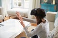 Young Woman Wearing Virtual Reality Headset In Studio Royalty Free Stock Photo