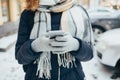 Young woman wearing warm coat and large scarf Royalty Free Stock Photo