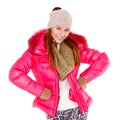 Young woman wearing winter jacket scarf and cap Royalty Free Stock Photo