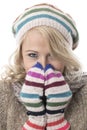 Young Woman Wearing a Wooly Hat and Gloves Royalty Free Stock Photo