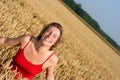 Young woman in wheat field Royalty Free Stock Photo