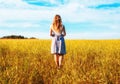 Young woman in wheat field