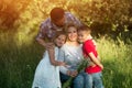 Young woman in wheelchair with her family. Family portrait Royalty Free Stock Photo