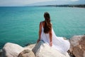 Young woman in white dress