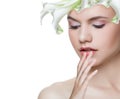 Young woman with white flower thinking isolated Royalty Free Stock Photo