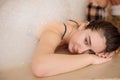 woman in white foam relaxing in a hamam Royalty Free Stock Photo