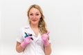 Young woman in white lab coat on white background microblasting master Royalty Free Stock Photo