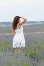 Young woman in white outdoors