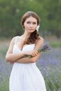 Young woman in white outdoors