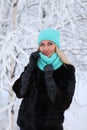 Young woman in a winter forest Royalty Free Stock Photo