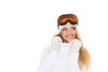 Young woman in winter warm clothes and ski glasses. Royalty Free Stock Photo