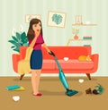 Young woman with wireless vacuum cleaner in the messy living room.