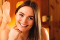 Young woman in wood sauna. Royalty Free Stock Photo