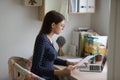 Young woman work online on computer at home office Royalty Free Stock Photo