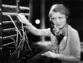 Young woman working as a telephone operator Royalty Free Stock Photo