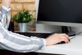 Young woman working on compute in the office