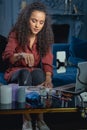 Young woman working with a crystal pendulum Royalty Free Stock Photo