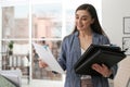 Young woman working with documents Royalty Free Stock Photo