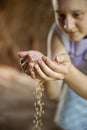 Young woman working with the grain