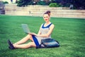 Young woman working on laptop computer outdoors in New York City Royalty Free Stock Photo