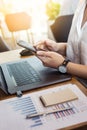 Young woman working laptop and smartphone. Royalty Free Stock Photo