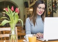 Young woman working online