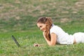 Young woman working in park