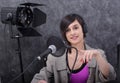 Young woman working on the radio