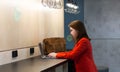 Young Woman working at wooden Bar Counter Royalty Free Stock Photo