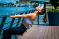 Young woman workout outdoor in the city promenade along the riv Royalty Free Stock Photo